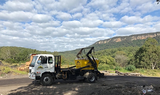 Truck at Recycling Site — Skip Bin Hire in Kiama, NSW