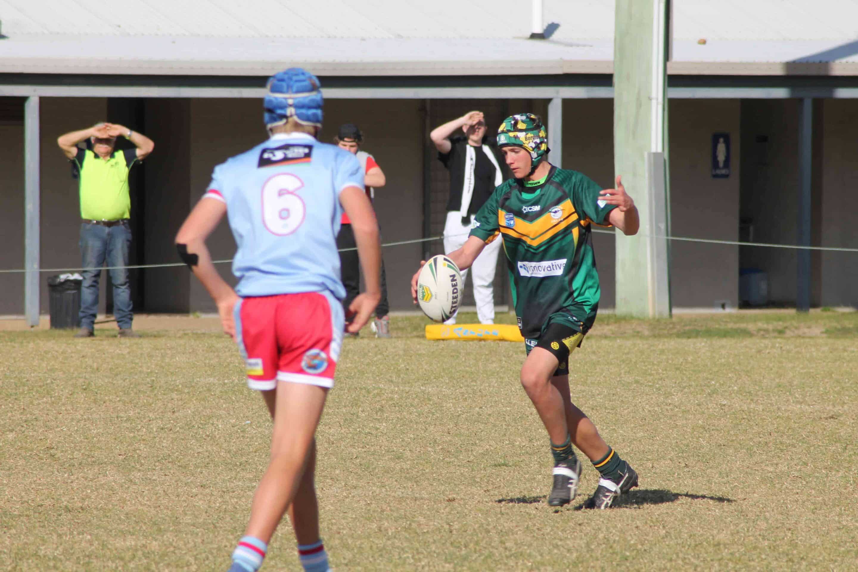 Two Boys Playing Rugby — Recycle in Port Kembla, NSW